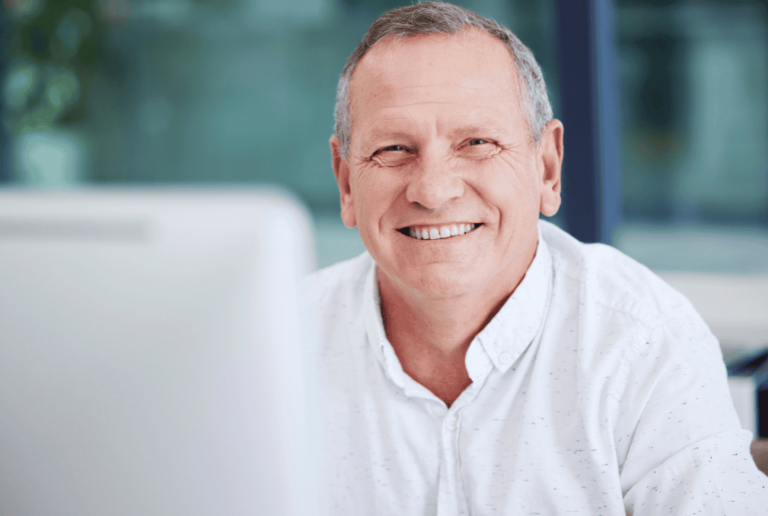 a business owner using pandadoc on his computer for efficient document management