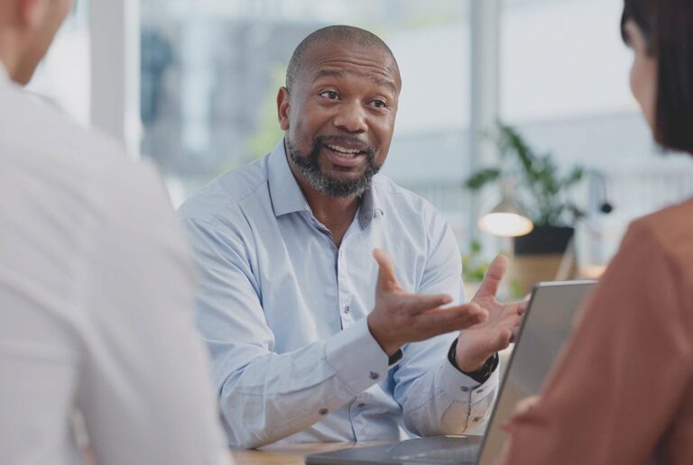 small business owners consulting with a fractional coo to boost business growth
