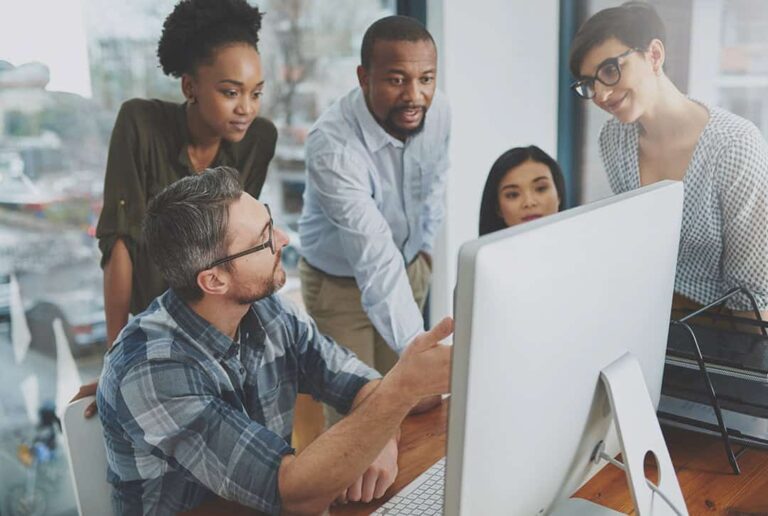 a manager assigns tasks to his employees using modern technology in project management