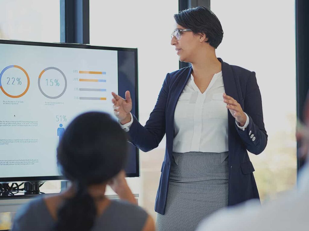 a small business owner disseminating information about good business continuity plan to her employees