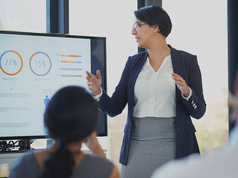 a small business owner disseminating information about good business continuity plan to her employees