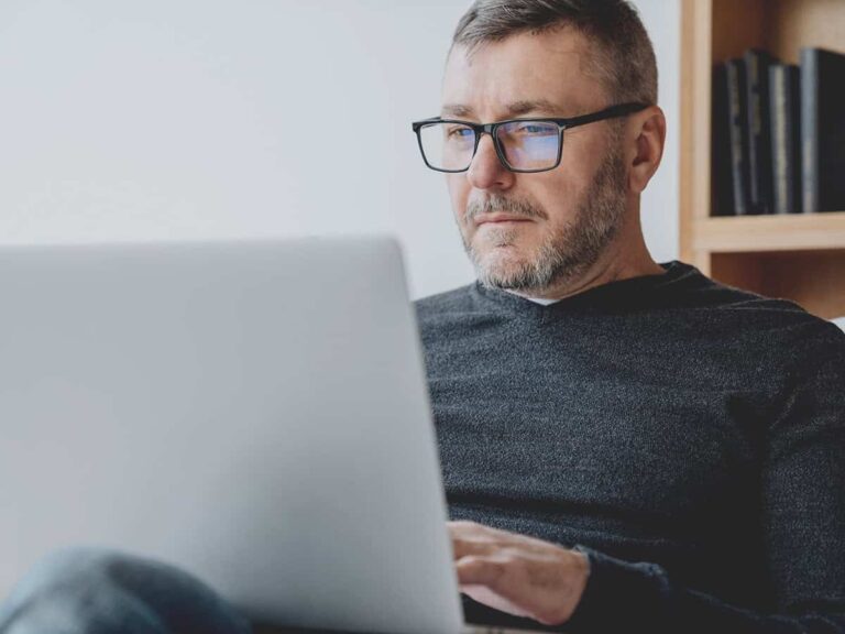 a male business owner looking up how to optimize hubspot for a better business workflow