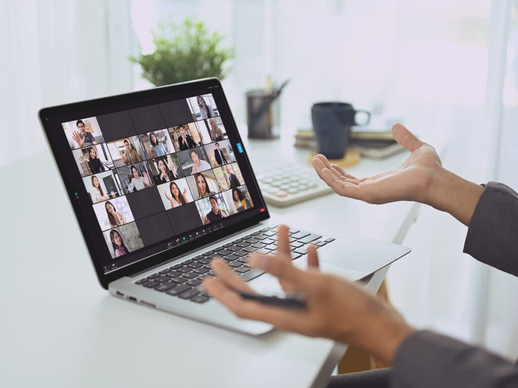 a business owner managing distributed teams via working online in a work from home set up
