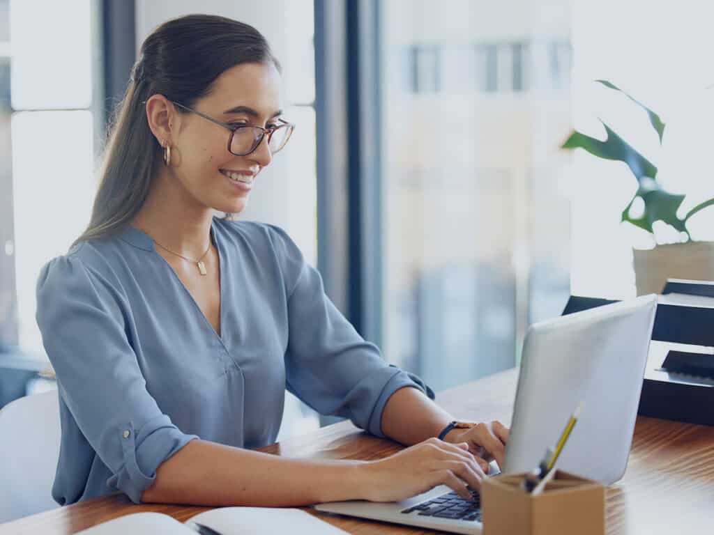 Female small business owner researching tools for process improvement