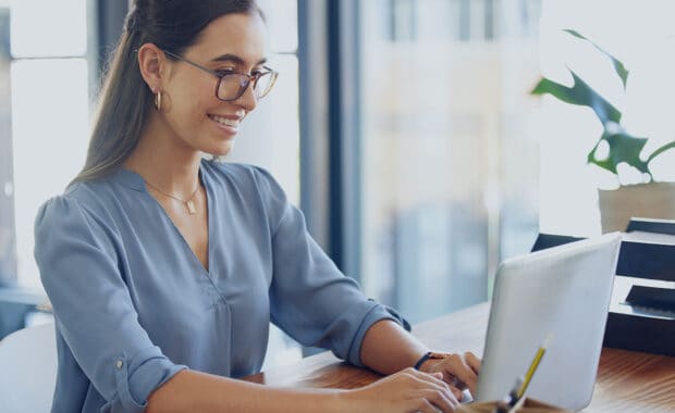 Female small business owner researching tools for process improvement