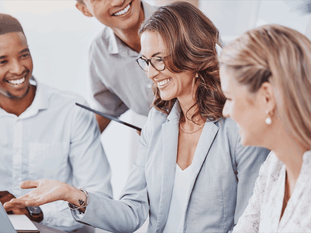 A business manager assigning tasks to her team