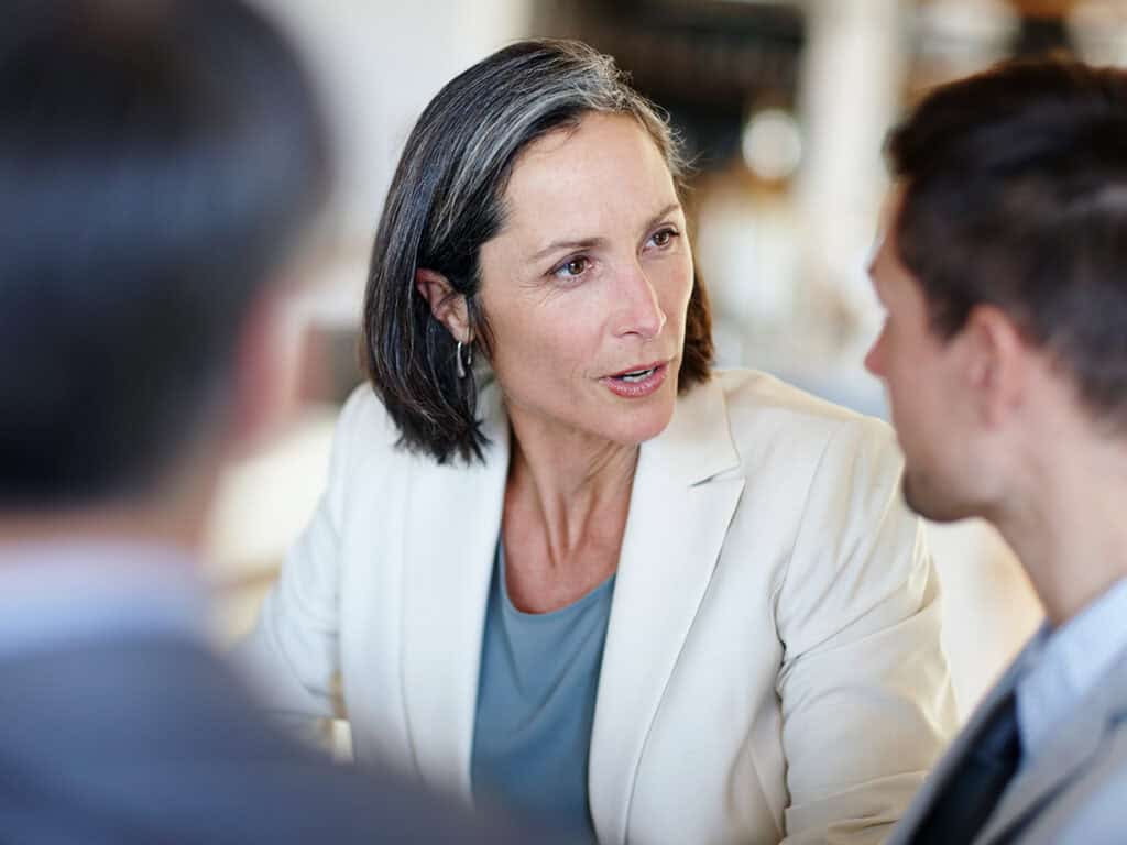 A small business owner assigning tasks as part of efficient task delegation