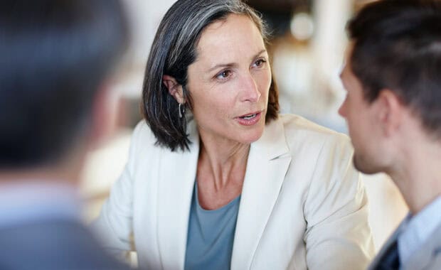 A small business owner assigning tasks as part of efficient task delegation