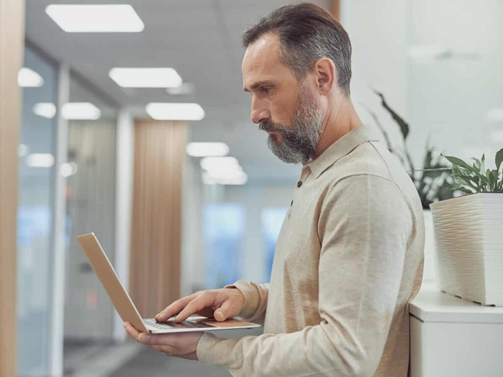 A small business owner troubleshooting causes of delay in project completion