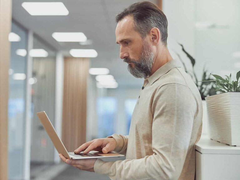 A small business owner troubleshooting causes of delay in project completion