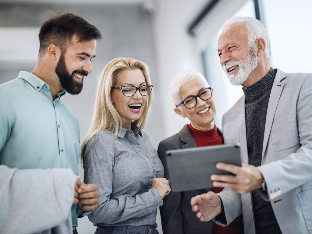 A small business owner and his team discussing project execution